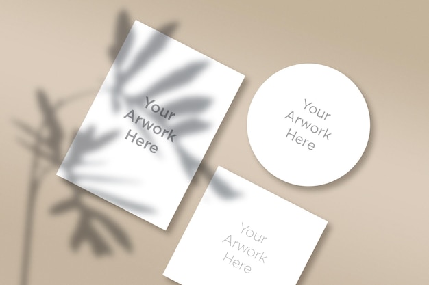 Flat Lay A4 and Two rounded Paper Mockup with leaves shadow