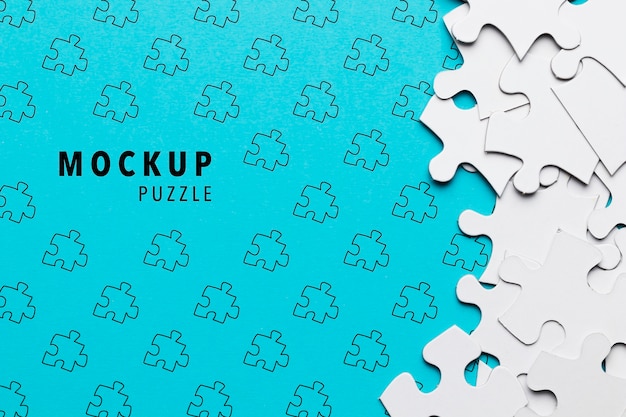 PSD flat lay arrangement with white puzzle pieces