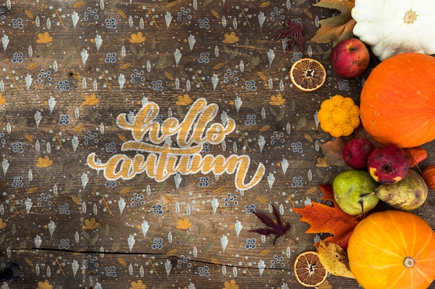 Flat lay of autumn harvest on wooden table