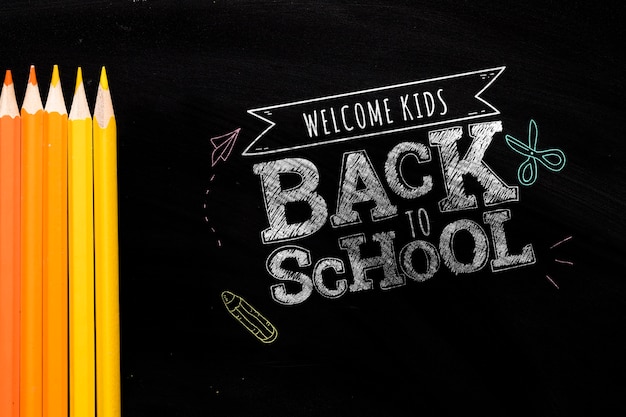 PSD flat lay back to school message on blackboard mock-up