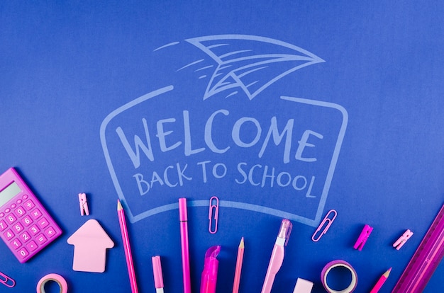 flat lay back to school with purple supplies