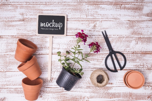 Flat lay blackboard mock-up with gardening elements