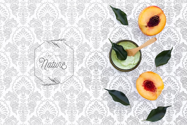 flat lay of body butter cream and nectarines