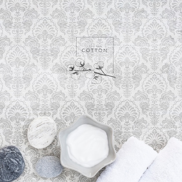 flat lay of body butter cream on plain background