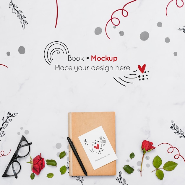 PSD flat lay of book with roses and glasses