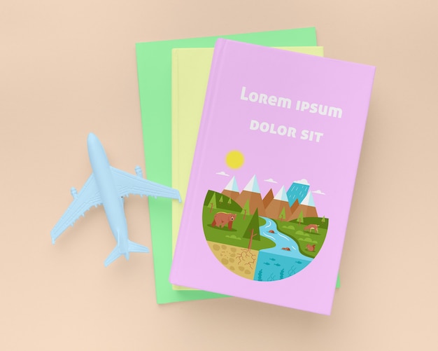 PSD flat lay books with blue plane