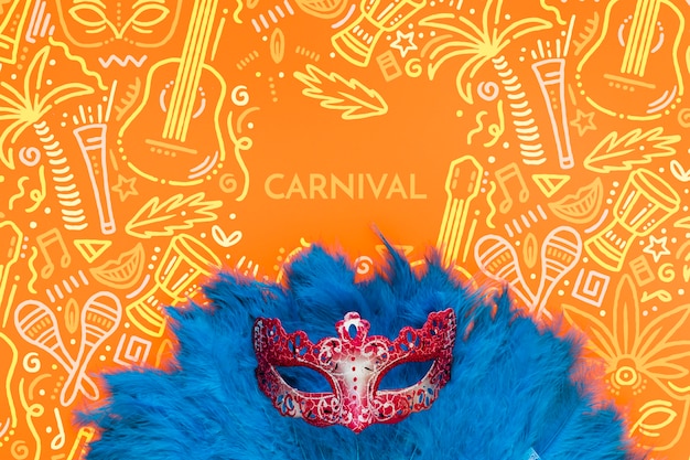 Flat lay of brazilian carnival mask with feathers