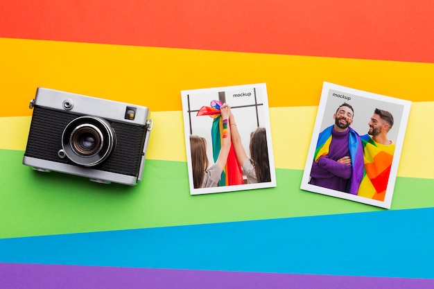 Flat lay of camera with pictures for pride