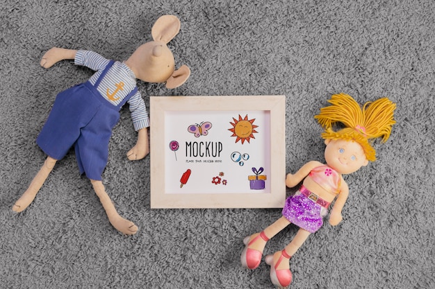 flat lay of children toys with frame