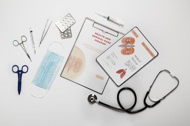 PSD flat lay clipboard and medicine arrangement