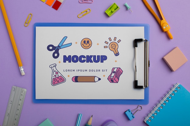 flat lay clipboard and pencils arrangement