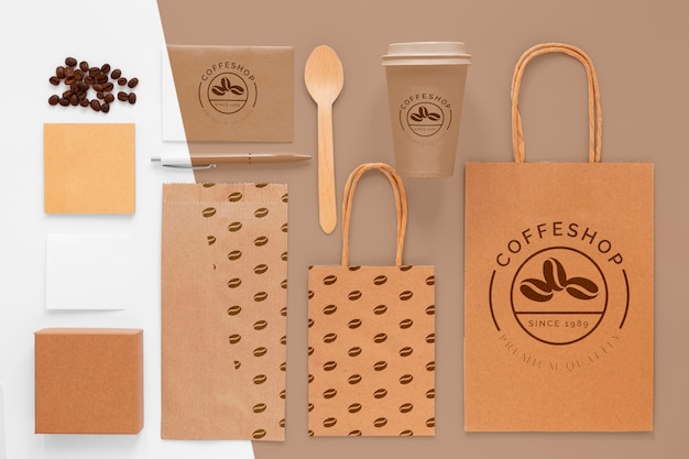 Flat lay coffee beans and branding items