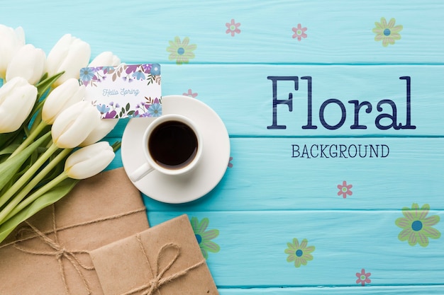 Flat lay of coffee cup with tulips and presents