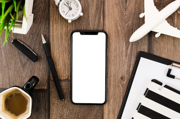 Flat lay coffee and smartphone mock-up on desk