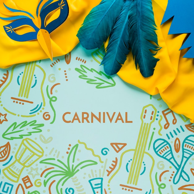 PSD flat lay of colorful carnival feathers and mask