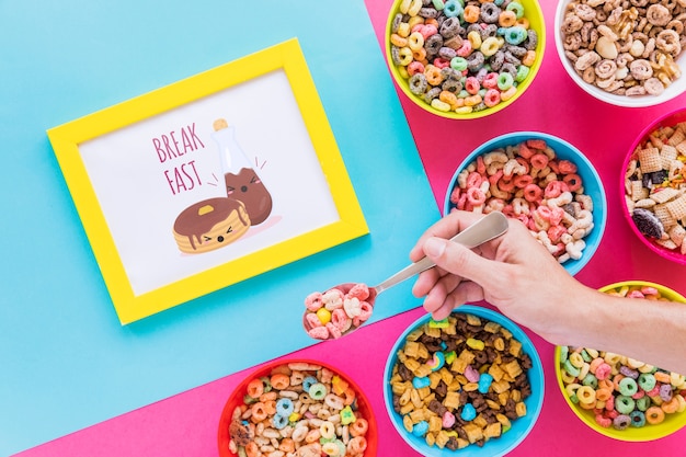 PSD flat lay of colorful cereals bowls and frame