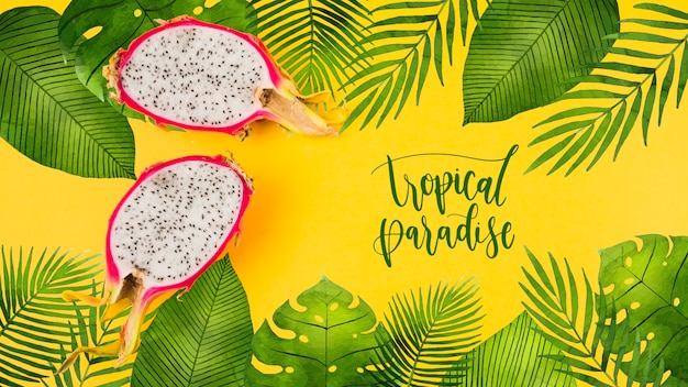 PSD flat lay copyspace mockup with tropical leaves