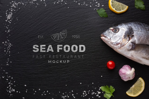 PSD flat lay delicious sea food assortment with mock-up