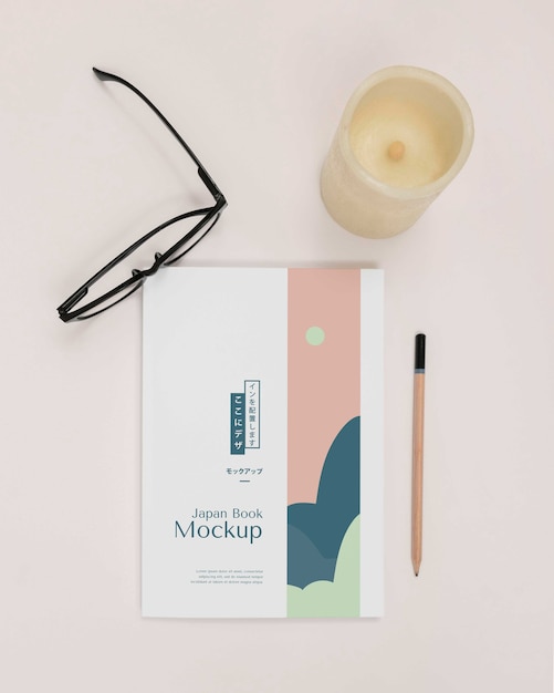 flat lay desk arrangement with book