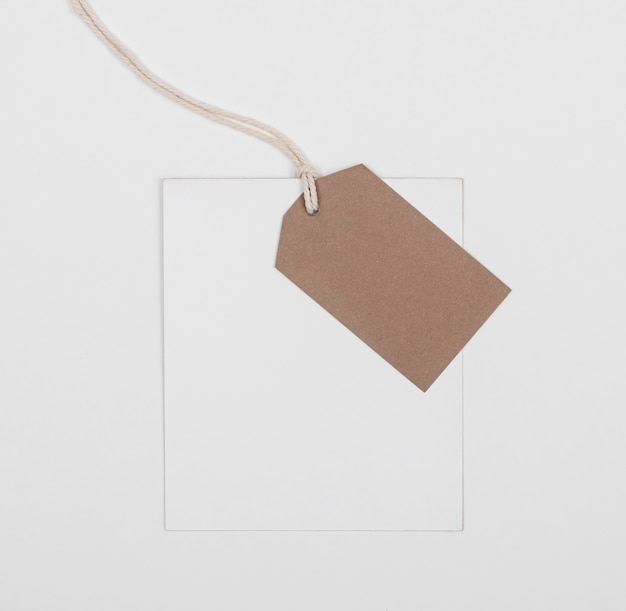 Flat lay eco tag on white background