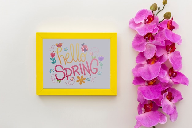 PSD flat lay frame mockup with spring flowers