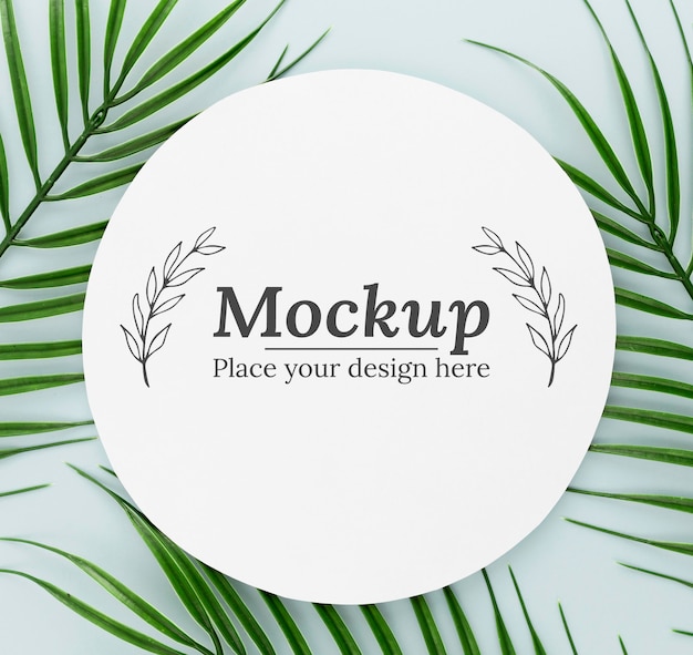 PSD flat lay green leaves composition with mock-up