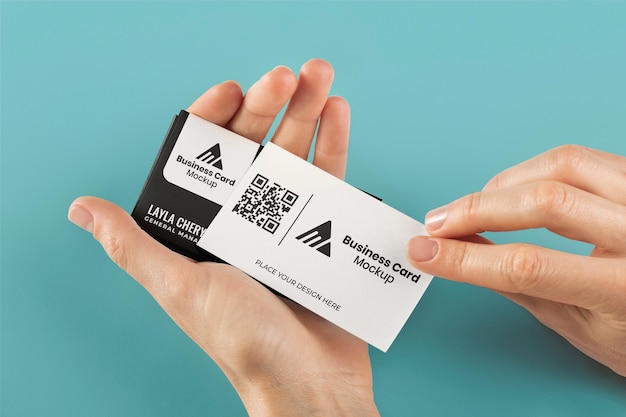 PSD flat lay hands holding business cards