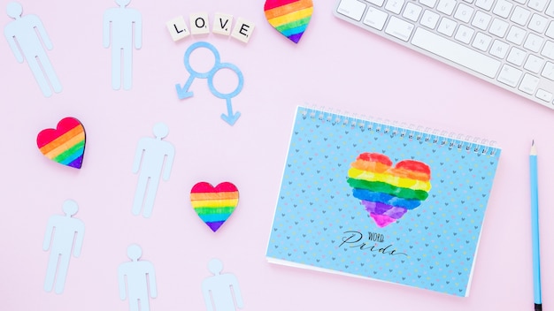 Flat lay lgbt pride composition with notepad template