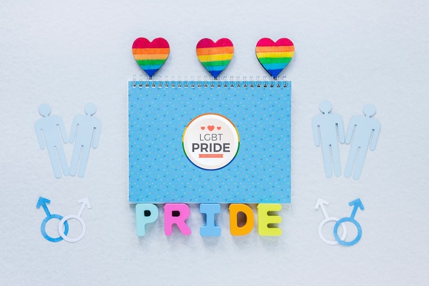 PSD flat lay lgbt pride composition with notepad template