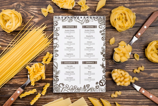 Flat lay menu and pasta arrangement