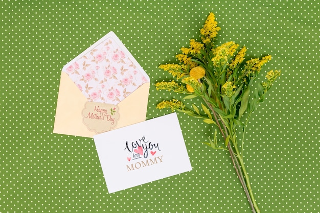 PSD flat lay mothers day composition with card mockup