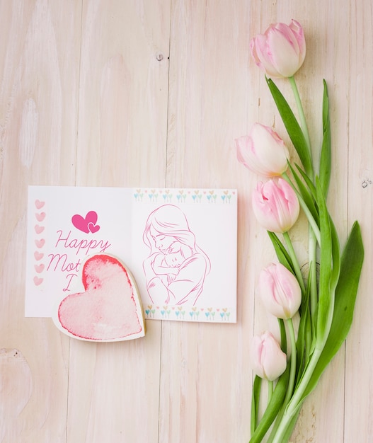 Flat lay mothers day composition with card mockup