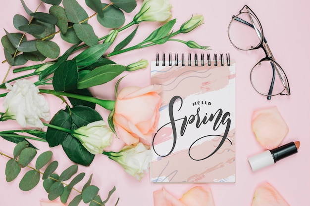 PSD flat lay notepad mockup with spring concept