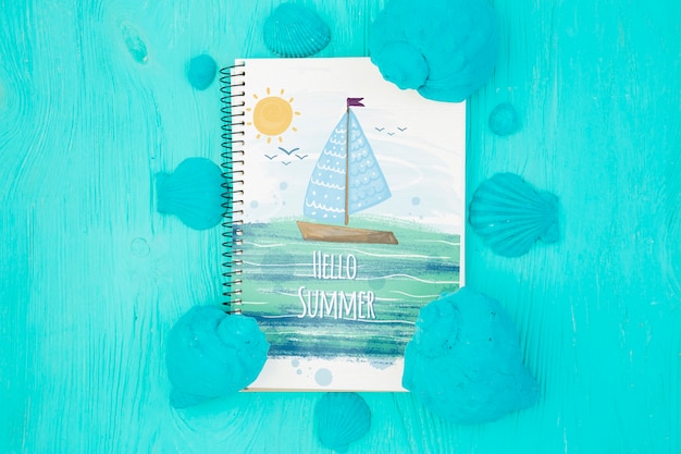 flat lay notepad mockup with summer elements