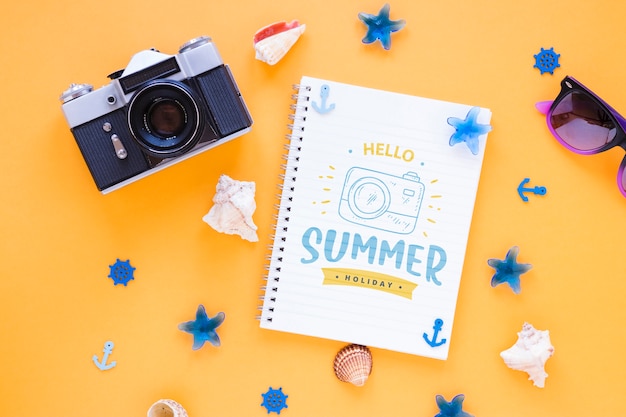 Flat lay notepad mockup with summer elements