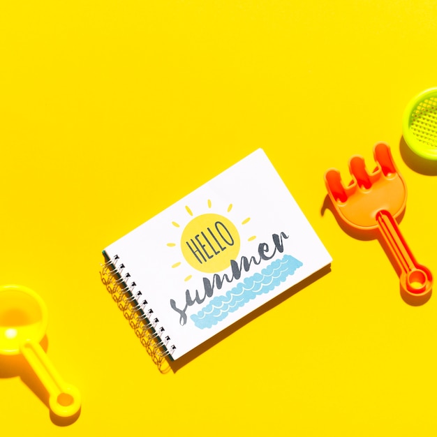 Flat lay notepad mockup with summer elements