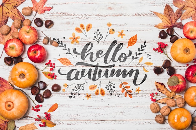 Flat lay pumpkin frame on wooden background