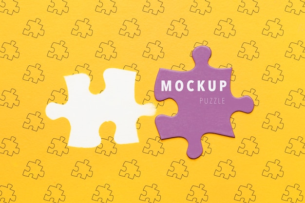 Flat lay purple piece of puzzle mock-up