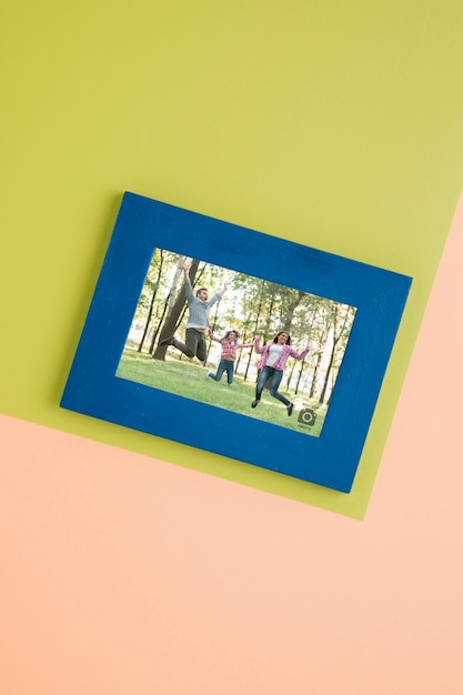 PSD flat lay of simple frame for photographs