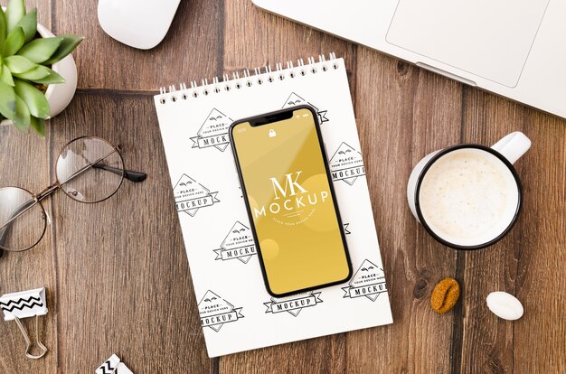 flat lay smartphone and notepad mock-up