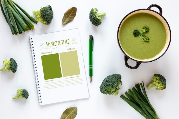 Flat lay soup with arrangement of ingredients and recipe mock-up
