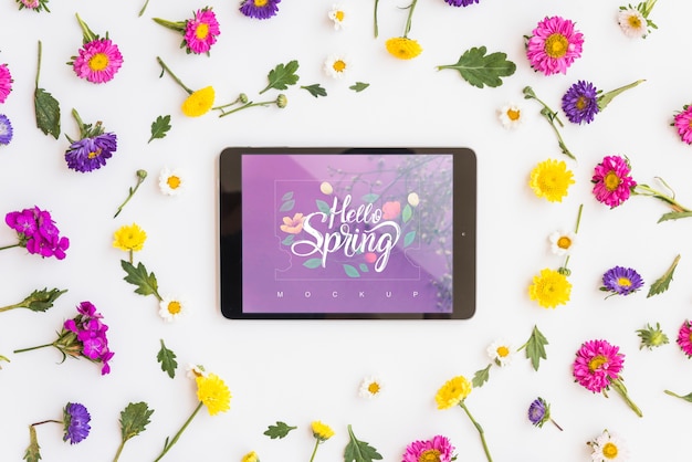 Flat lay tablet mockup with flowers