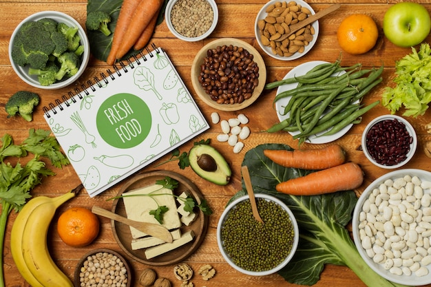 Flat lay vegetables with notebook mock-up