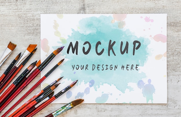 Flat lay watercolor elements composition with mock-up