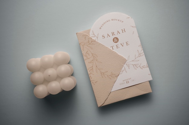 Flat lay wedding invitation in a natural background