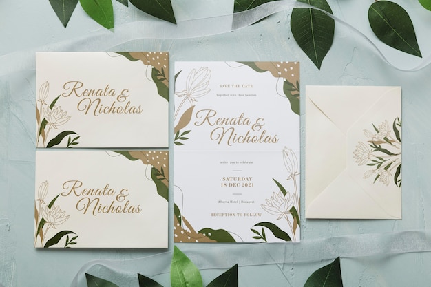 PSD flat lay wedding invitation with leaves