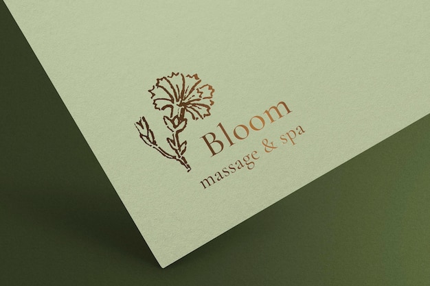 Flower logo mockup, gold paper pressed for wellness business psd