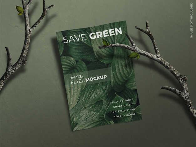 Volantino brochure poster o volantino mockup con messaggio verde salva e rami di albero