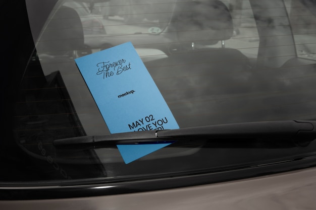 PSD flyer mock-up on car windshield