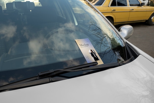 PSD flyer place on car windshield under wipers